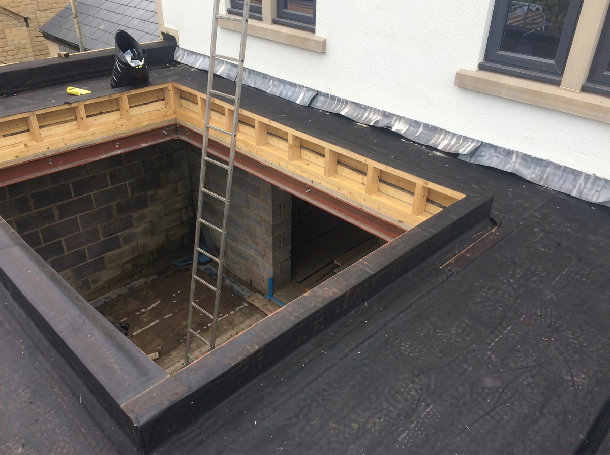 EPDM flat roof detail formed around a lightwell opening